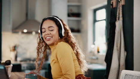 woman working from home while listening to music