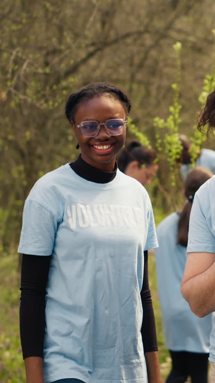 Happy Diverse Volunteers Smiling Together in a Green Park
