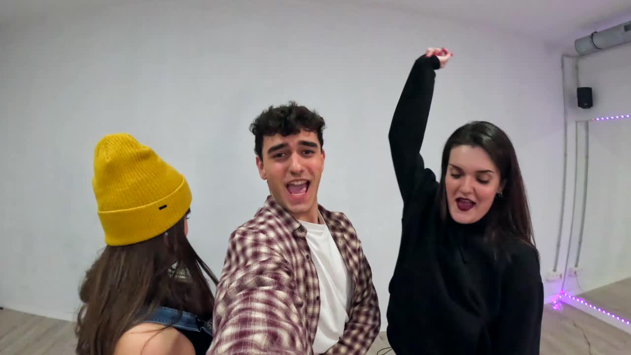 Group of people dancing in a studio