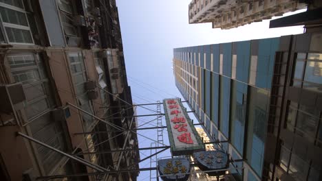 Looking-up-at-Skyscrapers-in-Hong-Kong