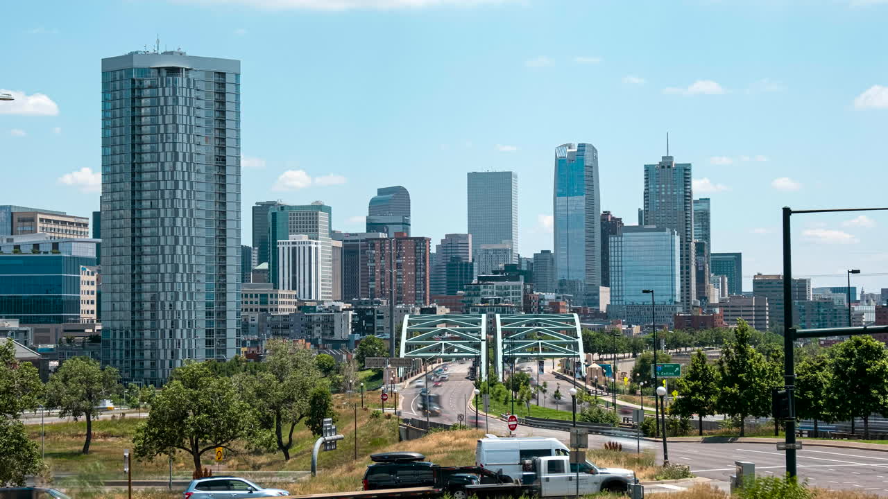 Time lapse of cars commuting across the Speer Boulevard Bridge into Denver's downtown district