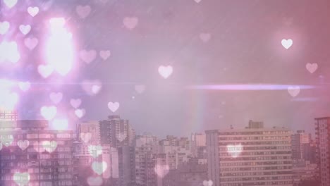 tall city buildings filled with hearts