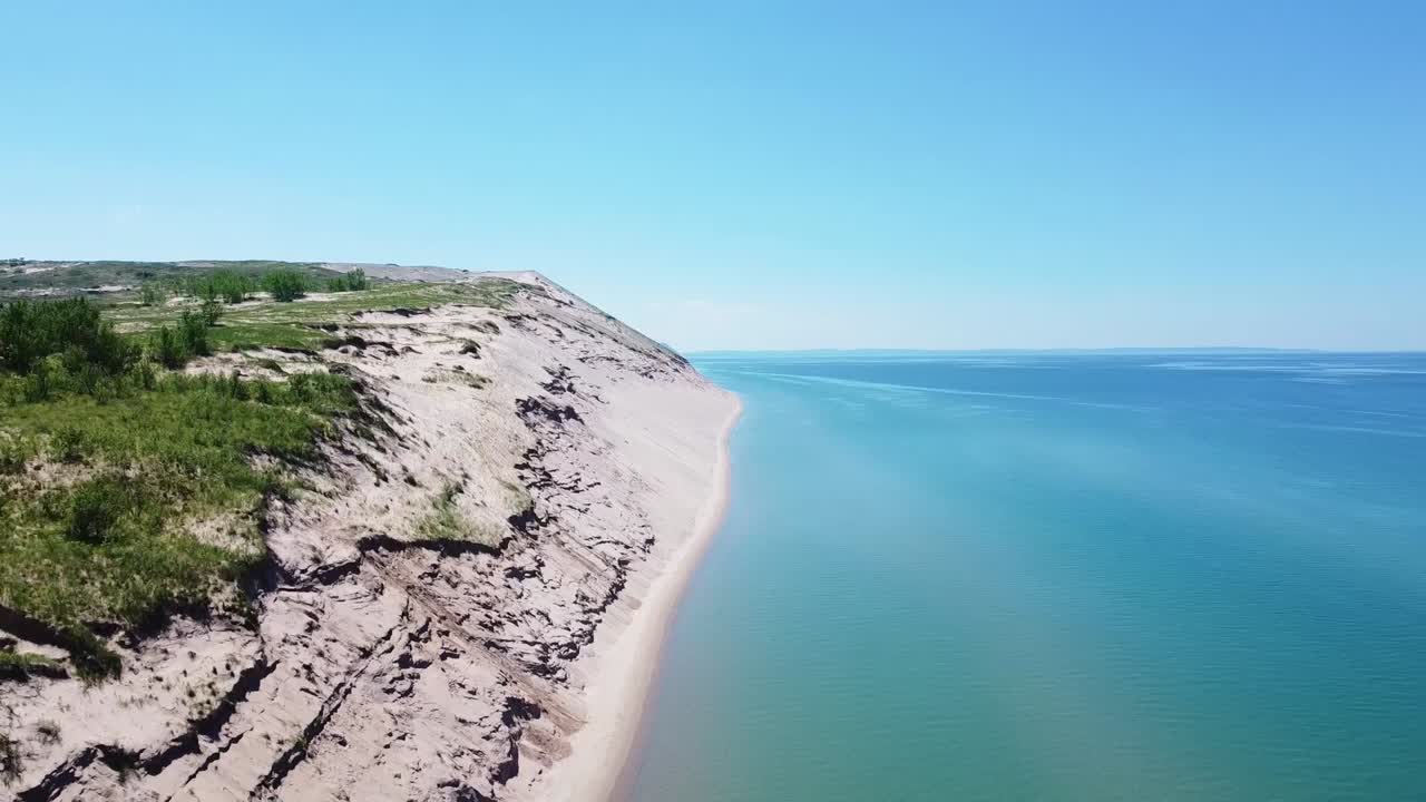 Aerial Descent of Sand Dune and Beach