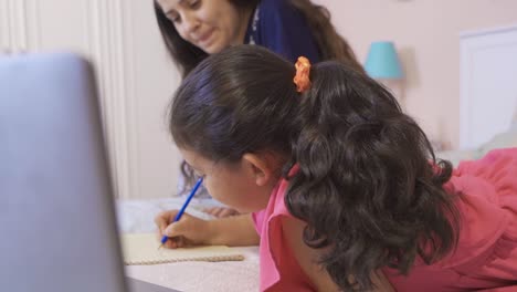 the girl and her mother are doing the lessons.