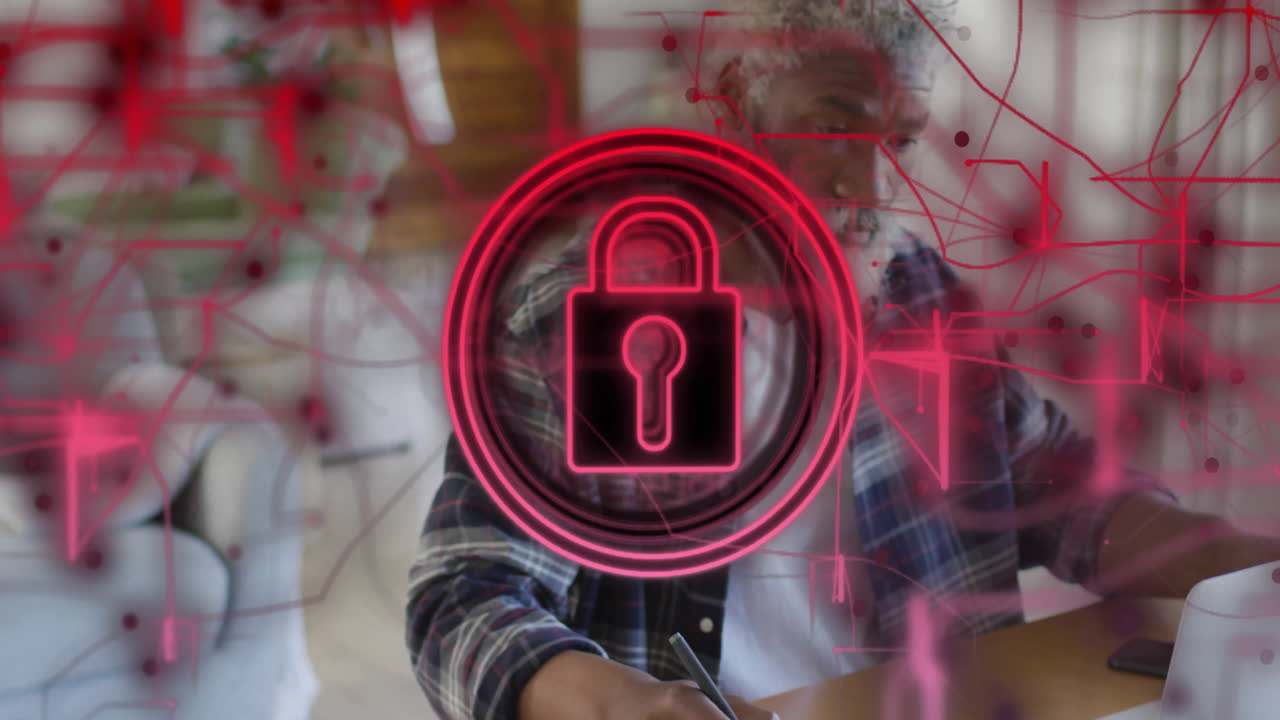 Man using stylus at home desk, showing neon padlock icon with red circuit lines in technology
