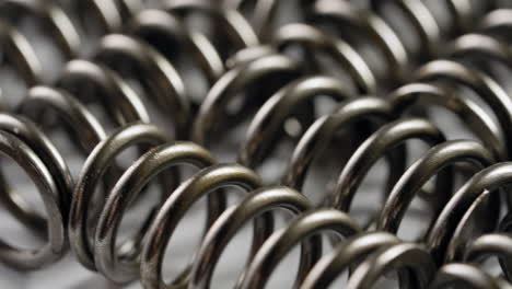 detailed close-up of thick metal springs in coil formation