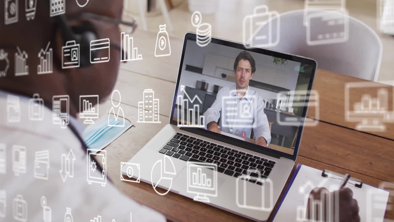 Animation of business icons over african american businessman using laptop for video call