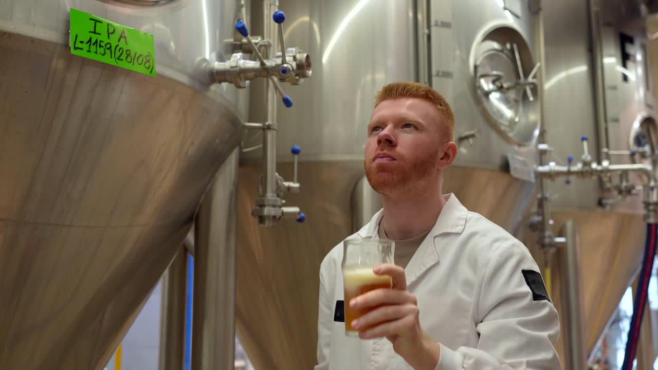 Man with Beer in Brewery