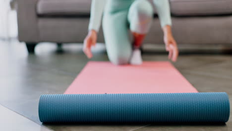 Fitness,-yoga-and-woman-rolling-mat-on-floor