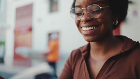 Woman-reading-book-with-happy-expression