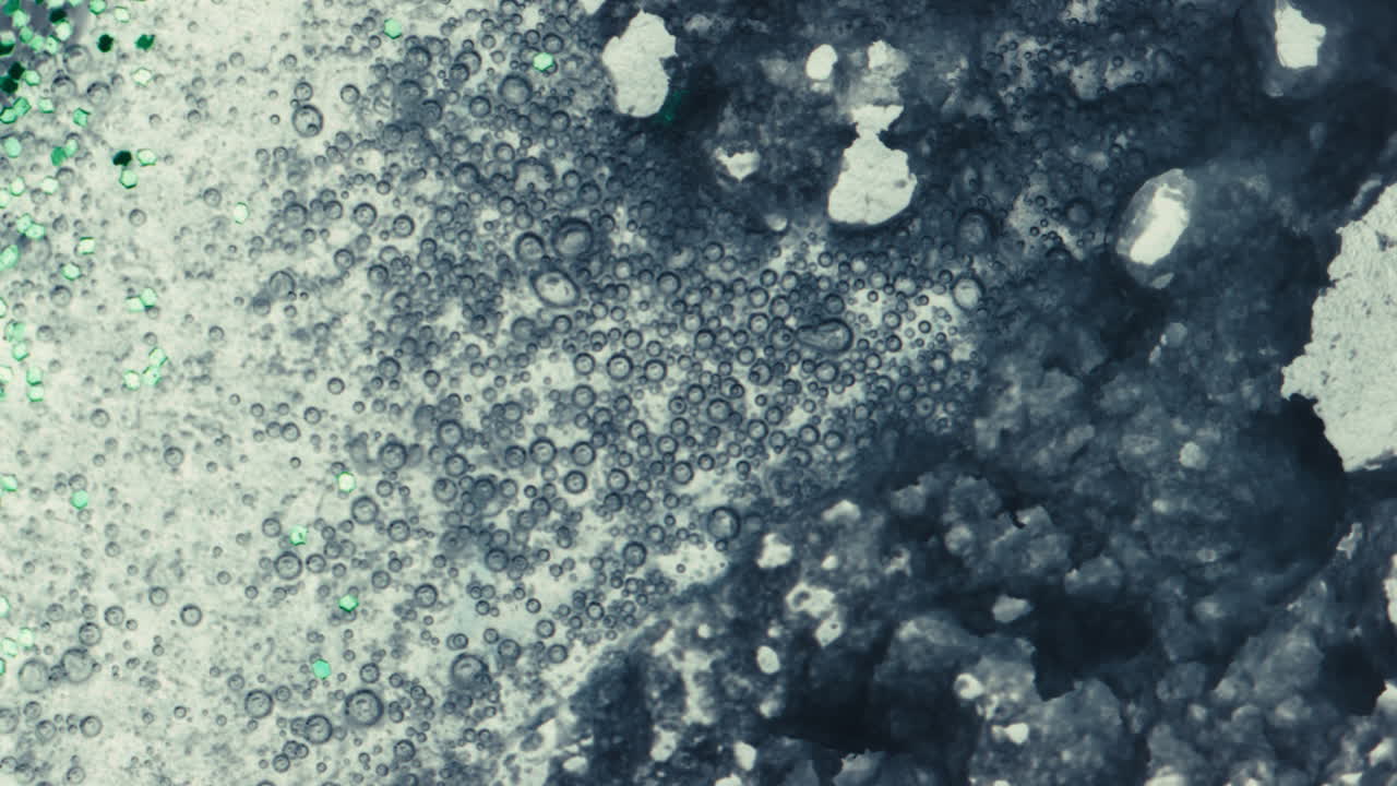 Abstract Liquid Art with Glitter and Bubbles