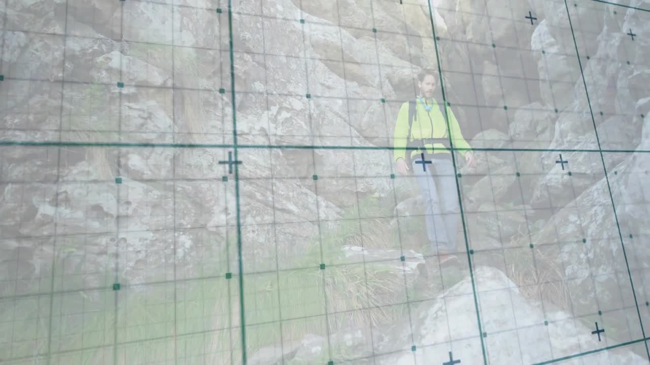 Camera panning and tilting over tech grid overlay revealing hiker descending for navigating terrain