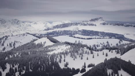 Flight-over-the-endless-layers-of-the-Austrian-Alps'-snow-covered-mountain-tops