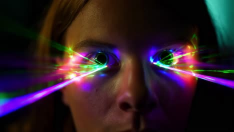 eyes illuminated with colorful lights