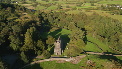 High-Establishing-Aerial-Drone-Shot-Around-St-Paul's-Church-and-Trees-at-Golden-Hour