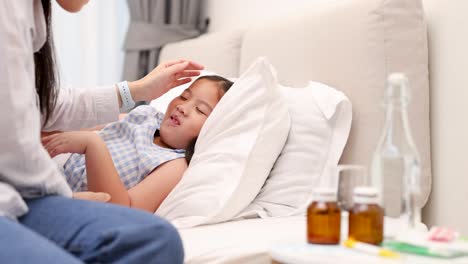 a mother tends to her sick daughter in bed, offering care and medicine in a softly lit room