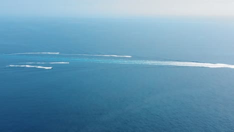 a group of sailing boats travelling across the south of france to monaco