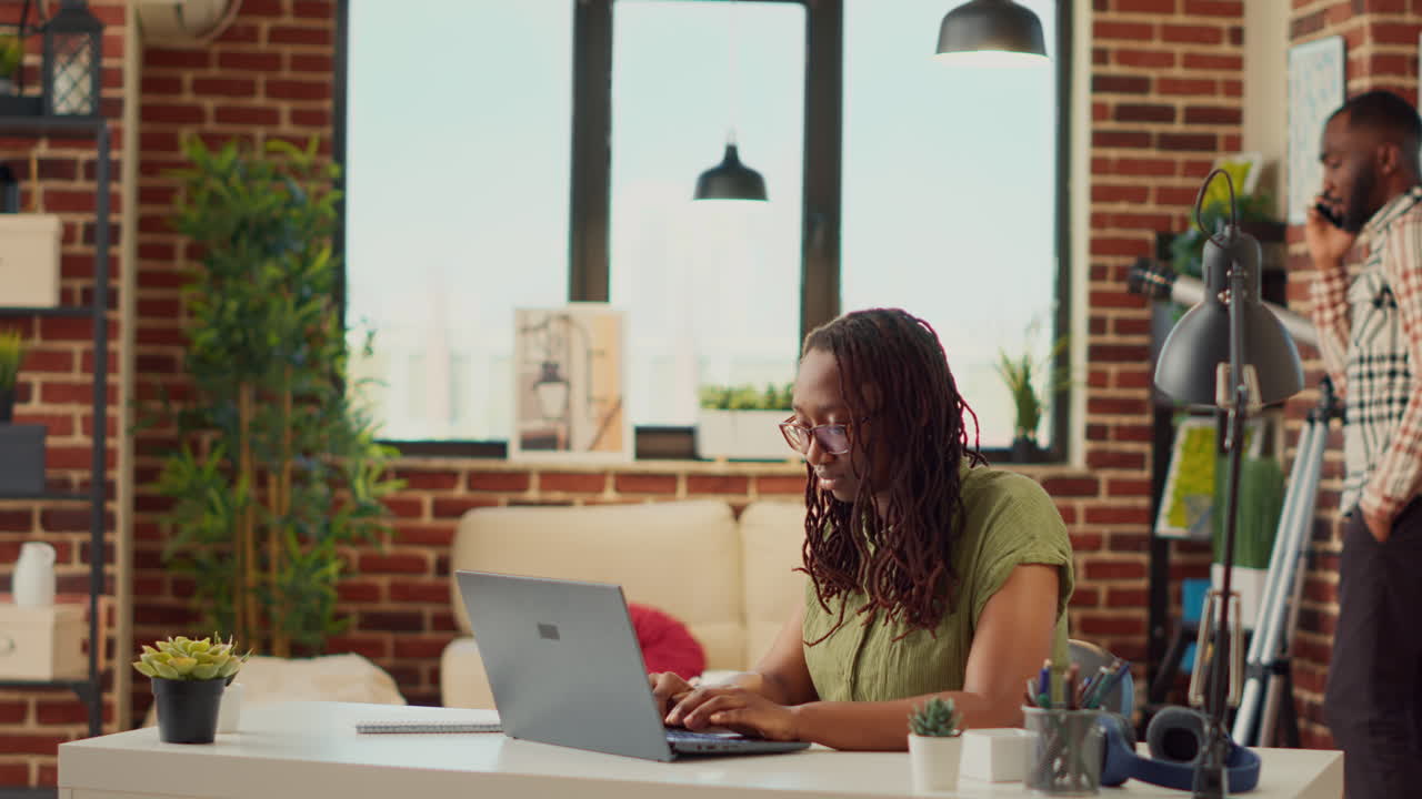 Young freelancer working remotely from home