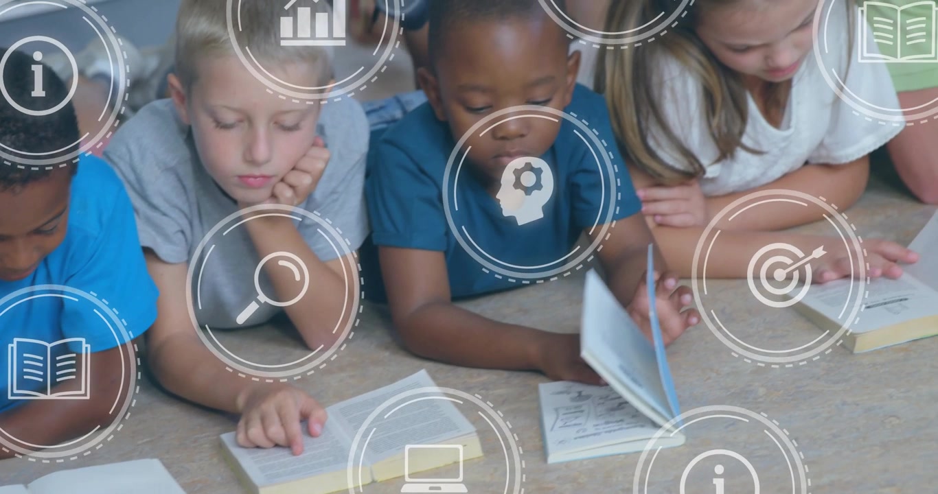 Kids reading on class rug, turning books and causing learning icons over books with adult helping