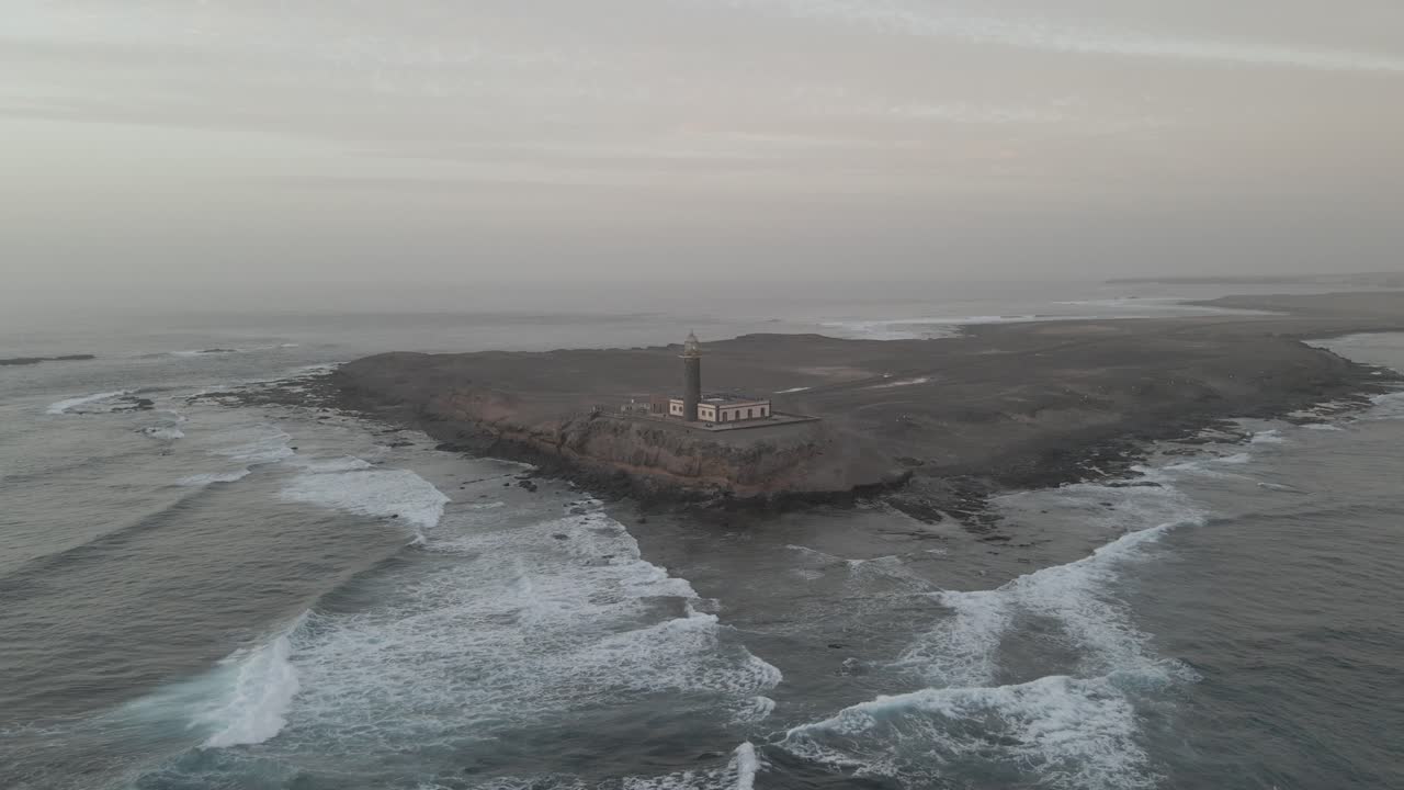 From a bird's eye view, behold the timeless charm of a cliffside lighthouse—an enduring symbol of coastal heritage and natural beauty—a classic scene that evokes nostalgia and wonder