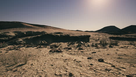 desert landscape in mongolia under a clear sky during daytime