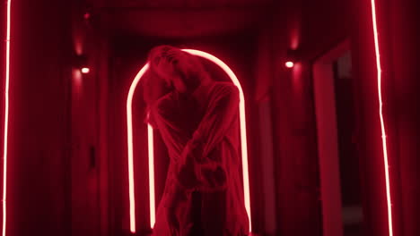 woman in red neon light