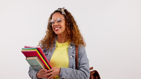 Student-woman,-thumbs-up-and-books-in-studio