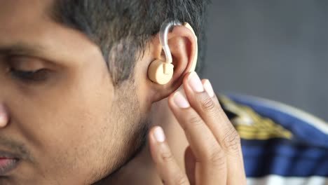 man wearing a hearing aid