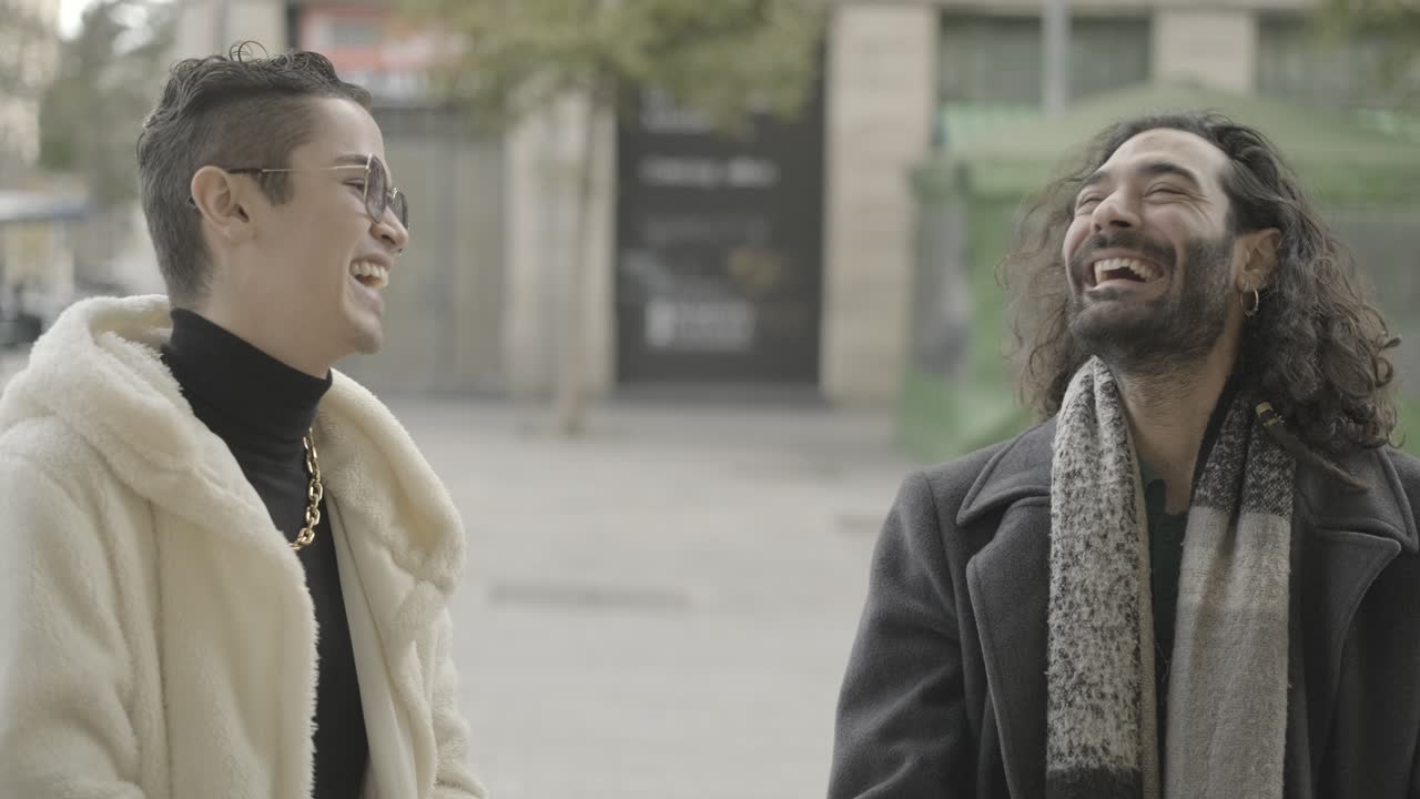 Two men enjoying a friendly conversation outdoors