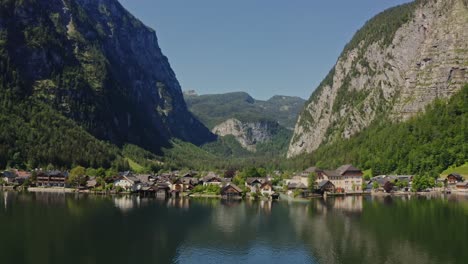 picturesque alpine village by a lake