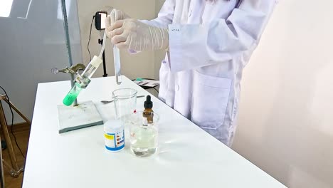 scientist conducts a chemical reaction between copper carbonate and sulfuric acid in a lab setting with controlled lighting