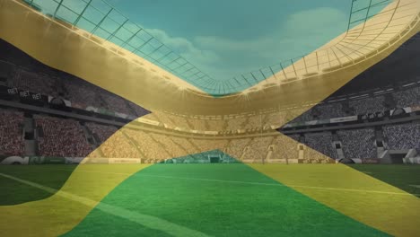 animation of waving jamaica flag against view of a sports stadium