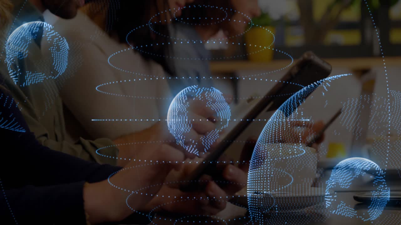 Animation of globes and spiral pattern, cropped hands of caucasian woman using digital tablet