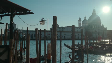 venice canal scene with gondolas and st. mark's basilica