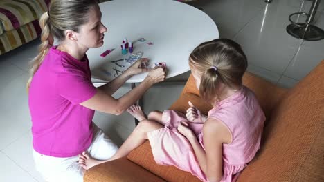 mother and daughter playing together