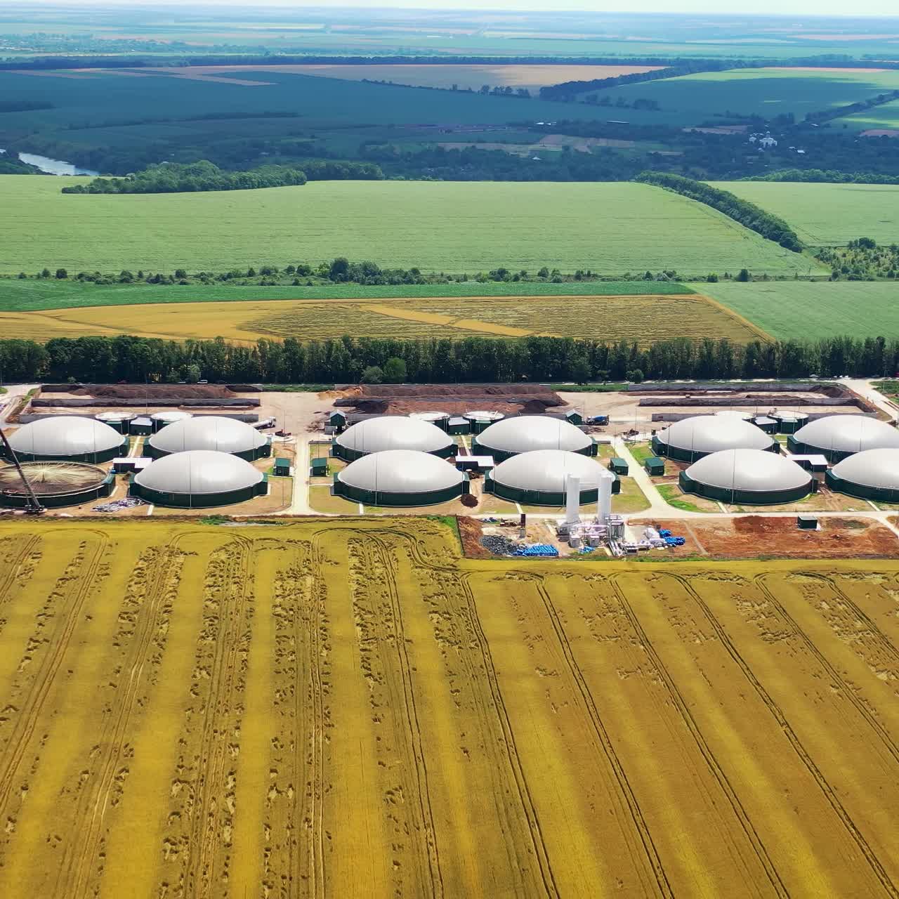 Big gas production factory aerial shot. Modern gas producing technology tanks