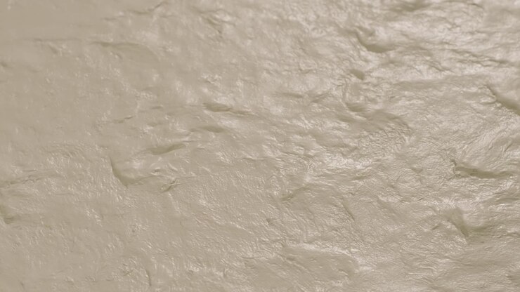 Parete decorativa intonacata effetto pietra