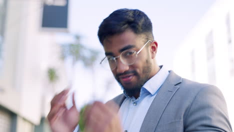 City,-smile-and-Indian-businessman-with-glasses