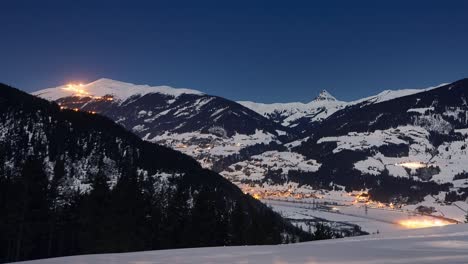 Time-lapse-of-scenic-snowy-panorama-of-a-ski-resort-in-winter-at-night