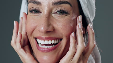 happy woman with a towel on her head