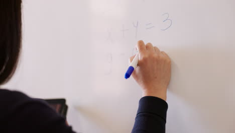 whiteboard, writing and professor in math lecture