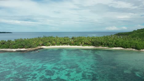 A-Scenic-View-At-Fiji-Island-With-A-Crystal-Clear-Water-And-Green-Forest-On-A-Sunny-Summer-Day