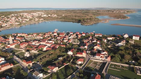 Historic-town-Nin-in-Croatia,-region-of-Zadar,-situated-in-a-lagoon-on-the-eastern-shore-of-the-Adriatic-Sea,-known-by-natural-sandy-beaches,-with-two-stone-bridges-from-the-16th-century