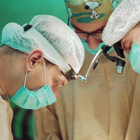 team surgeons at work in operating room
