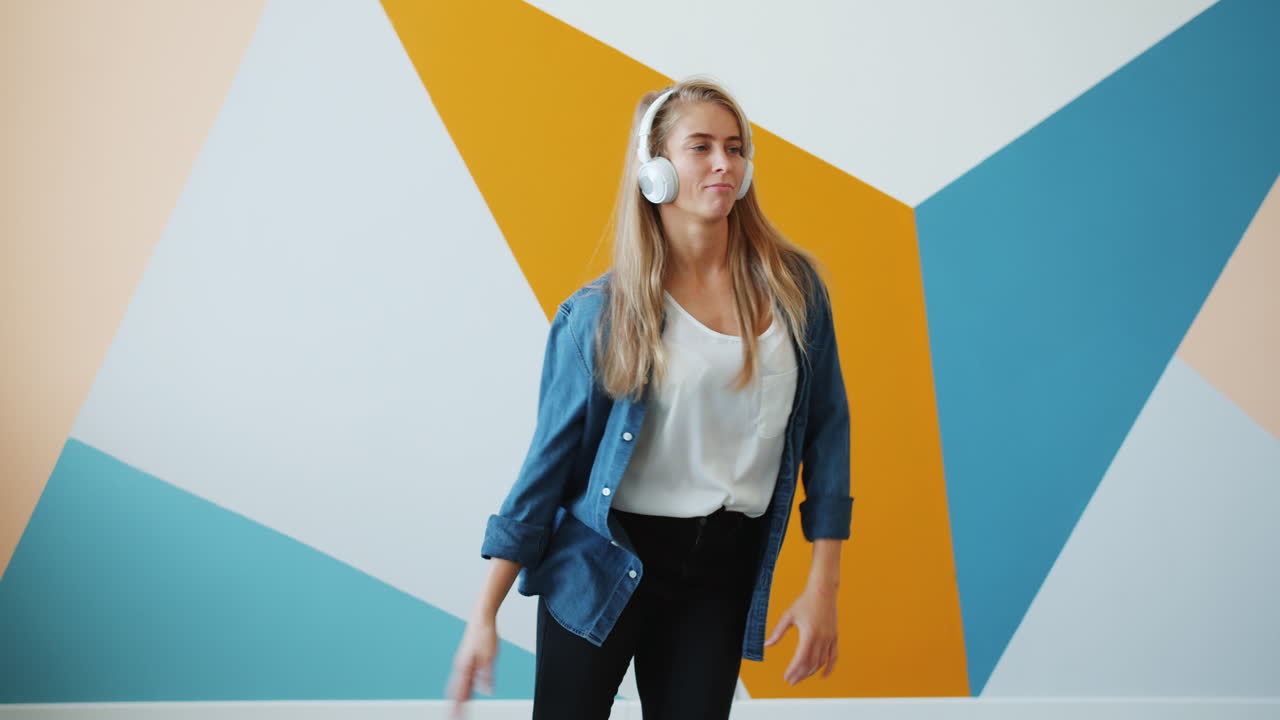 Woman Dancing to Music with Headphones