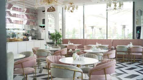 front view of stylish and light dining table in restaurant wide shot, close up shot,