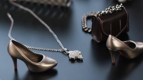 high heels, handbag, and necklace