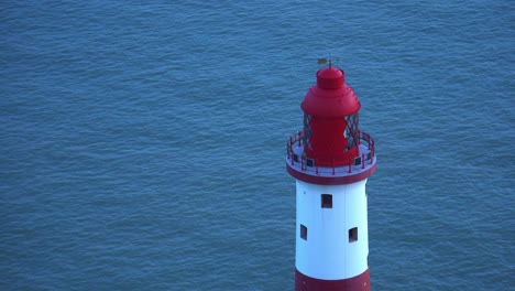 white and red lighthouse, close-up shot