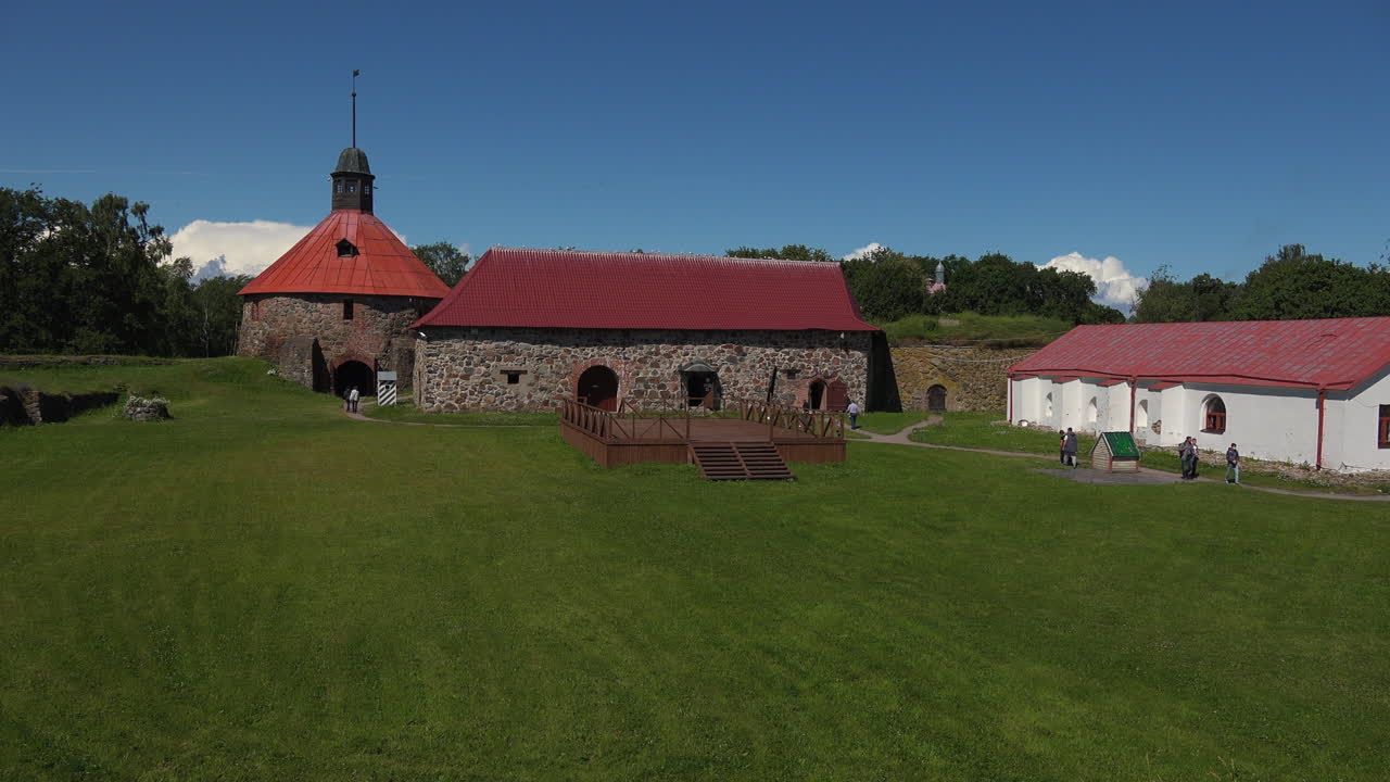 A long panning view of Museum fortress korela in which green foliage enhancing its charms, Russia