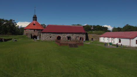 a long panning view of museum fortress korela in which green foliage enhancing its charms, russia
